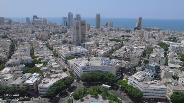 Revealing Dizengoff Square on a very hot day without people and activity near the fountain - pull back shot