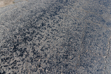 a part of an asphalt highway in close-up