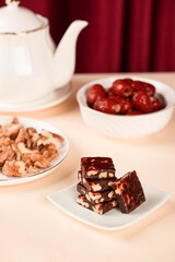 Black sesame balls walnut candies, round and square candies, healthy breakfast, delicious snack