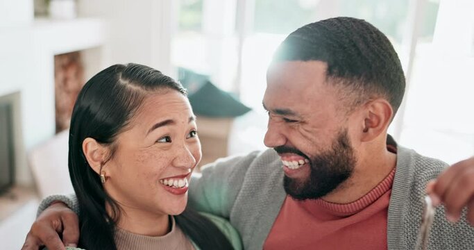 Happy couple, selfie and keys to new house with love and excited about moving in together. Social media, profile picture and interracial man and woman with mortgage, rent or loan for real estate