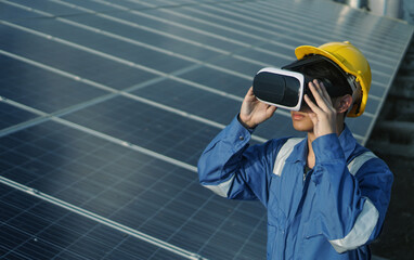 Engineer inspect and check solar cell panel and wearing vr glasses to view solar panel information  renewable energy power factory concept  lowkey lighting.