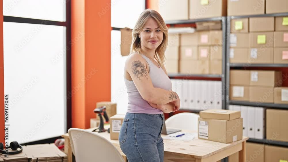 Sticker young blonde woman ecommerce business worker standing with arms crossed gesture smiling at office