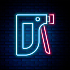Glowing neon line Construction stapler icon isolated on brick wall background. Working tool. Colorful outline concept. Vector