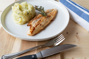 Pangasius fillet with mashed potatoes and zucchini