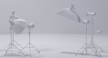 Photography studio flash on a lighting stand on monochrome background