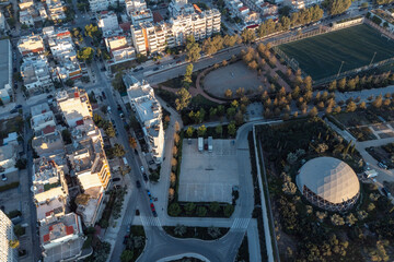 Athens Garden Fragment with Residential Backdrop: A Slice of Urban Life