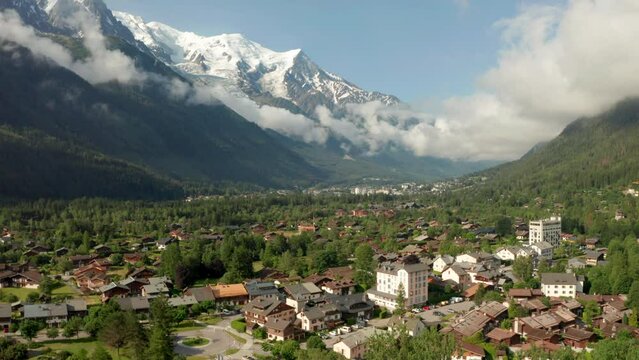 Low aerial slider shot of Chamonix town France