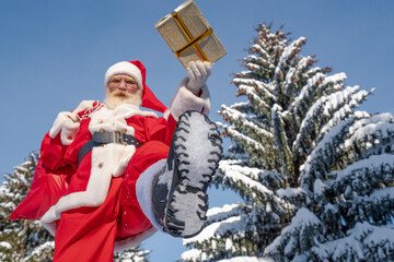 Xmas Santa Claus with real beard in the northern forest in winter