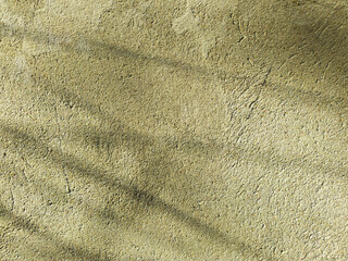 Cement surface close-up. An old wall with abstract thin shadows on it. - 639207010