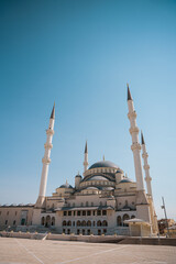 Fototapeta na wymiar Ankara Kocatepe Mosque with its 4 minarets looks vertically from side
