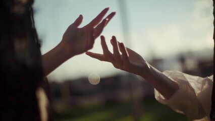 Two female hands touching and feeling the gentle and innocent love, friendship, emotional attachment