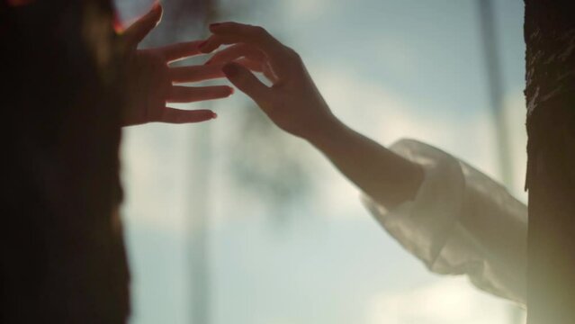 Female hands tend to touch one another, emotional love, togetherness, human relation, separation concept 