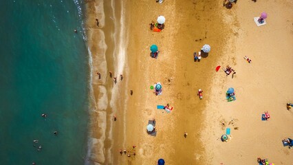 Fototapeta na wymiar Aerial View From Flying Drone Of People Crowd Relaxing On Beach In Italy, Rimini