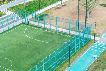 Outdoor recreation. Recreation area in the city. A football field with fencing. Outdoor sports....
