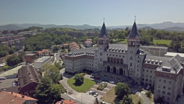 Aerial shot tracking around Elizbarrutiko Seminario and Parque de Serafin Baroja in San Sebastian,Spain.