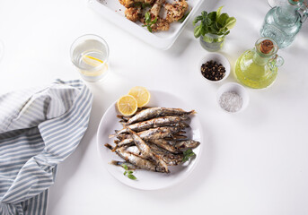 Fried capelin or smelt small fish with lemon