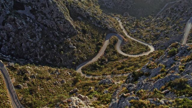 Sa Calobra Road At Coll dels Reis Rocky Mountain Pass In Serra de Tramuntana, Balearic Islands, Mallorca Spain. Aerial Shot