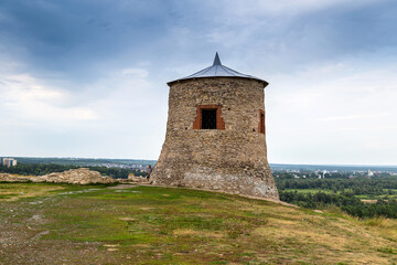 One of the towers of the ancient fortress of the ancient Bulgarian Yelabuga settlement and view of...