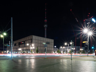 Fototapeta premium View of the crossroads of the Berlin road and the light trails left by cars. Night Berlin Alexanderplatz.