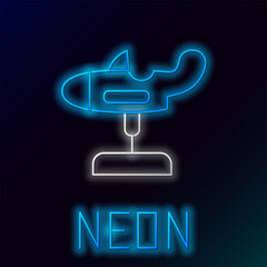 Glowing neon line Swing plane on the playground icon isolated on black background. Childrens carousel with plane. Amusement icon. Colorful outline concept. Vector