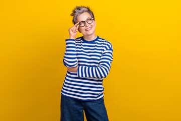 Photo of pensioner woman grey dyed stylish haircut intelligent library worker touch glasses look...