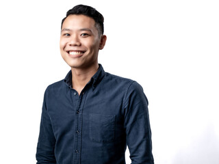 Fototapeta premium A portrait of an Asian man wearing a blue shirt, standing in a confident pose. Isolated with a white background.