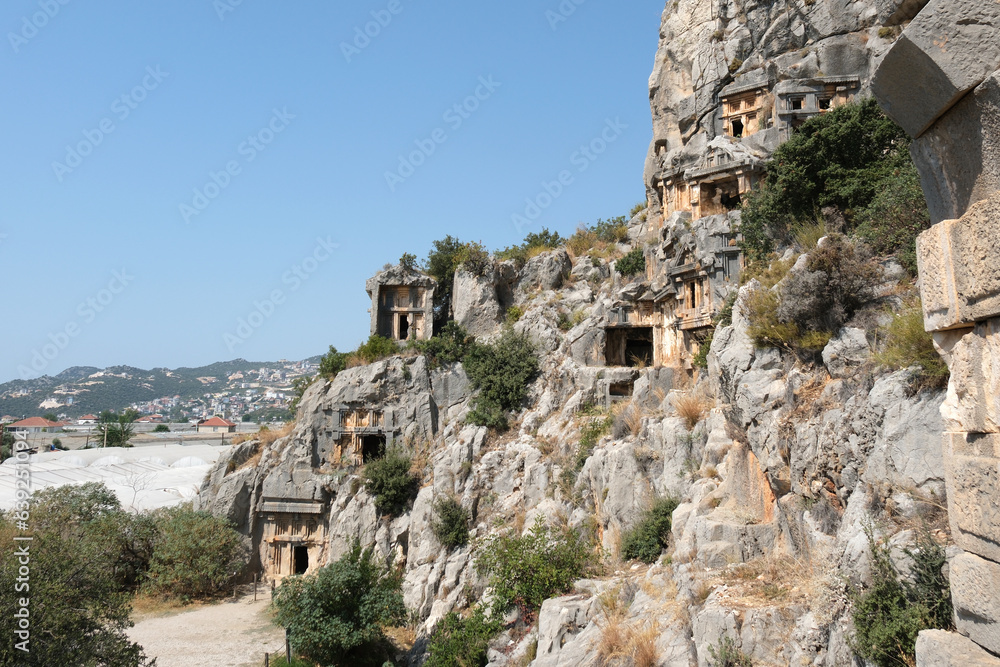 Wall mural Myra rock cut tombs. Lycian carved stone tombs. Ruins of Myra Ancient Site in Demre, Antalya, Türkiye.