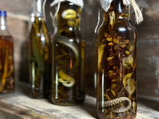 Tincture on a poisonous snake. Snake Alcoholic Drink with herbals Canned snake in vodka.