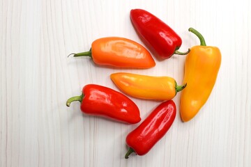 Vibrant chilli peppers. Assorted colorful varieties of hot and sweet peppers or chilies on a farm...