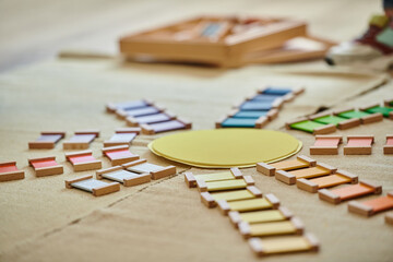 Fototapeta na wymiar Montessori materials for teaching colors, sun shape, game, early school education, childhood