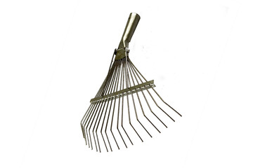 Metal rake for collecting leaves in the garden. wonderful gardening tools.Shovel, shovel-shovel...