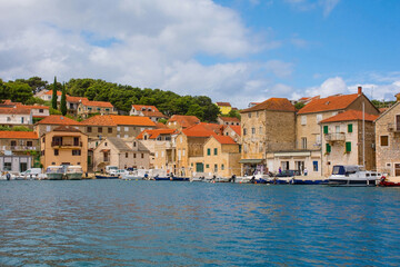 Fototapeta na wymiar The waterfront of Milna Village on the west coast of Brac Island in Croatia