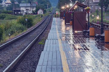 Railway track by the wooden platform.