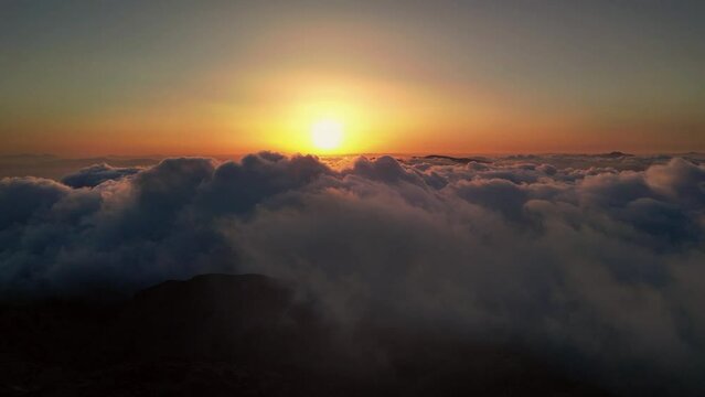 view of the clouds and sunrise in the height