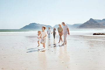 Family holding hands on beach, generations and travel with grandparents, parents and kids outdoor....
