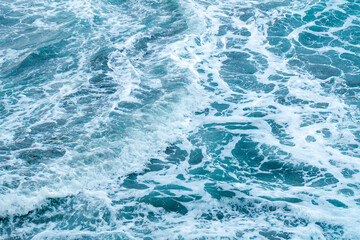Beautiful blue wave water for abstract background from natural sea ocean in summer, motion texture...