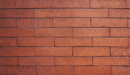 Red brick wall background texture close up