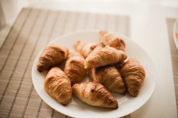 croissant on wooden table