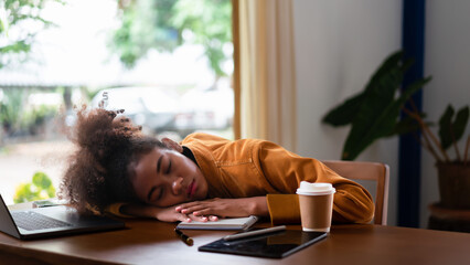 African american businesswoman sleeping with exhausted after working to thoughtful of new business