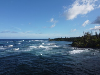 Aerial drone footage of the island of Maui in Hawaii showing the beach and mountains