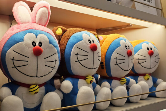 BANGKOK, THAILAND - AUGUST 23, 2023: Doraemon Dolls on the Shelf. Doraemon is a Japanese manga series written and illustrated by Fujiko F. Fujio.