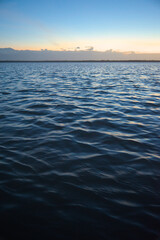Los Flamencos National Reserve, Colombia - January 2 2023: Sunset sea close-up view romantic beautiful background