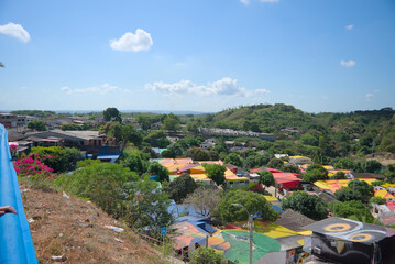 Usiacuri, Colombia - January 4 2023: Aerial panorama of Usiacuri, Colombia at noon with  colorful houses and rooftops