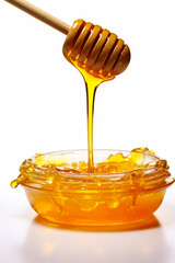 Honey dip being poured into bowl of honey syrup with wooden spoon.