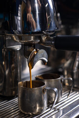 A bartender prepares coffee, close-up