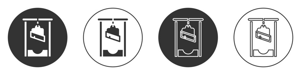 Black Guillotine medieval execution icon isolated on white background. Circle button. Vector
