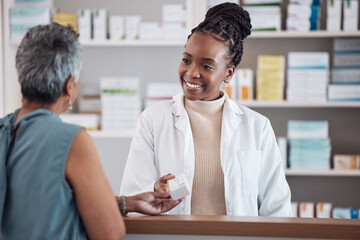 Pharmacist, pharmacy woman and customer for medicine service, healthcare advice and clinic solution or support by counter. African doctor or medical people with box for pills, product or retail drugs