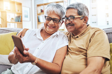 Senior couple, smile and phone on sofa for social media, reading digital news and notification with glasses. Happy elderly man, woman and scroll on smartphone for app, website and relax in retirement - obrazy, fototapety, plakaty