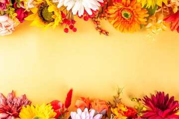 Autumn holidays greeting card background. Autumn red, orange, bright flowers and leaves a big bouquet on white gold background. Teacher's Day, Thanksgiving Day, Halloween background