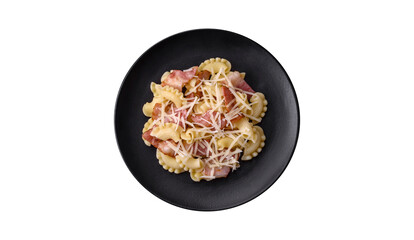 Delicious pasta with bacon and parmesan cheese on a black ceramic plate